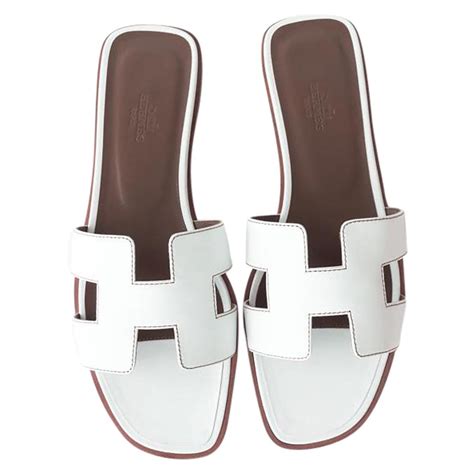 hermes oran white sandals|More.